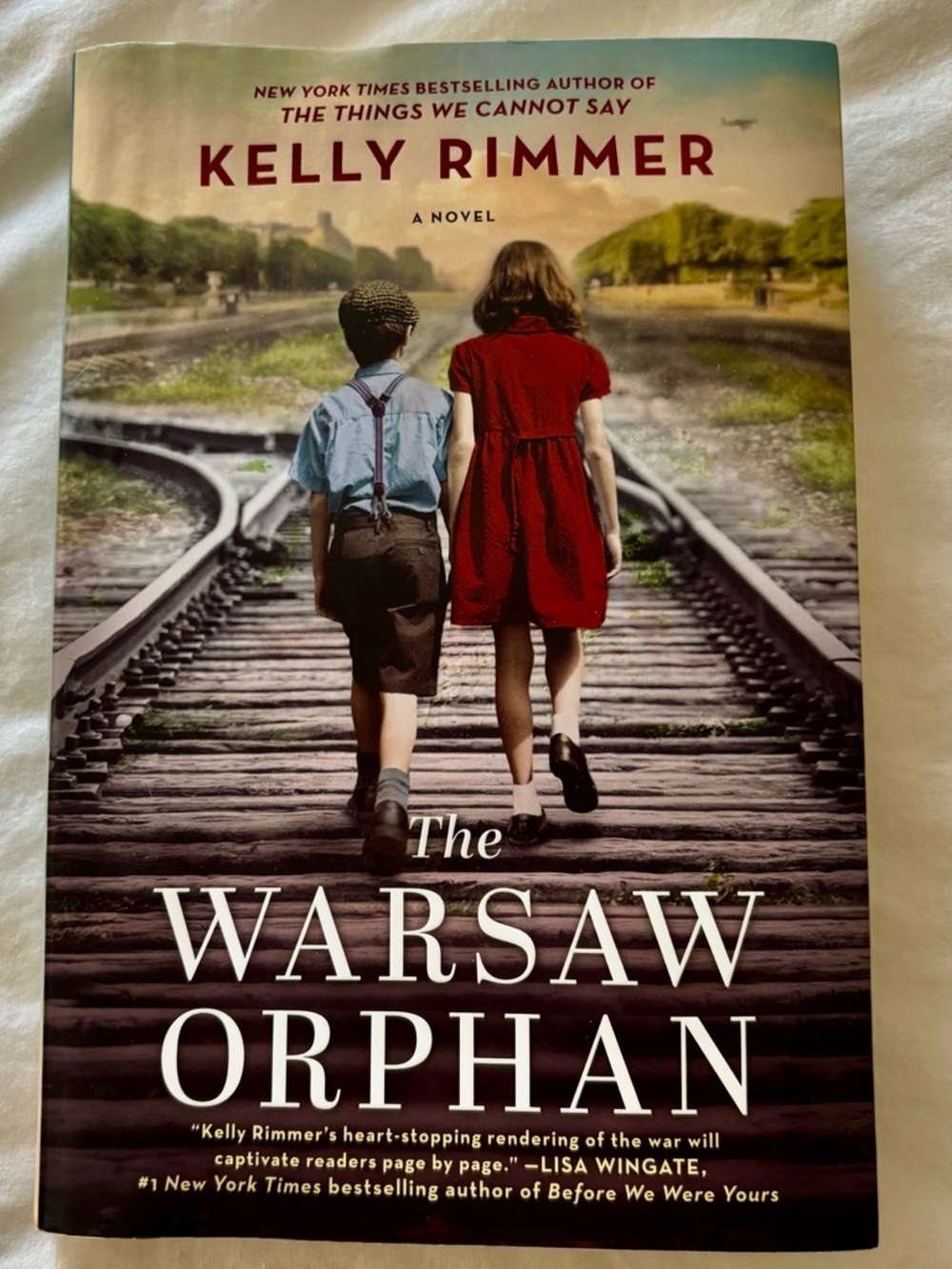 THE WARSAW ORPHAN a Best selling novel by Kelly Rimmer-WW11 historical